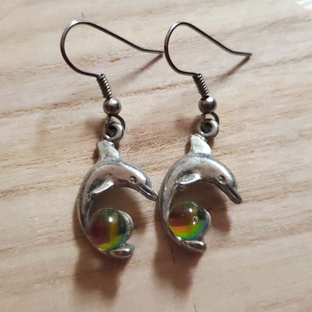 Dancing dolphin earrings with faux moonstone